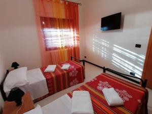 Posteľ alebo postele v izbe v ubytovaní Bed and breakfast lagiocosa
