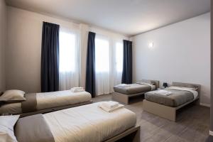 Postel nebo postele na pokoji v ubytování Casa a Colori Padova