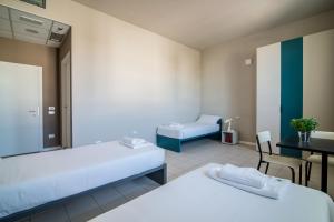 Postel nebo postele na pokoji v ubytování Casa a Colori Padova + 37 fotografií