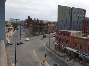 a view of a city street with cars and buildings at Shandon Apt premium Liverpool City Centre in Liverpool