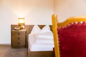 Letto o letti in una camera di Hotel Weisses Lamm