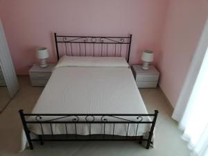 Posteľ alebo postele v izbe v ubytovaní L'elicriso B&B