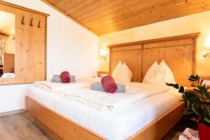 Postel nebo postele na pokoji v ubytování Landhotel Hinteraigengut