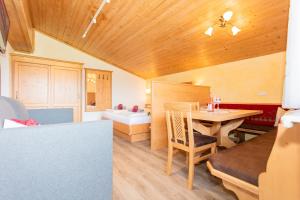 Postel nebo postele na pokoji v ubytování Landhotel Hinteraigengut