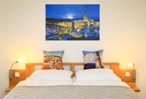Postel nebo postele na pokoji v ubytování Hotel Garni Villa Areka