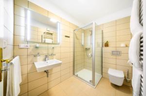 Koupelna v ubytování Hotel Garni Villa Areka