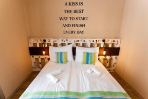 Postel nebo postele na pokoji v ubytování Hotel Carpe Diem