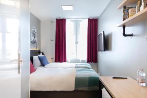 Llit o llits en una habitació de Generator Hamburg