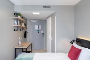Llit o llits en una habitació de Generator Hamburg