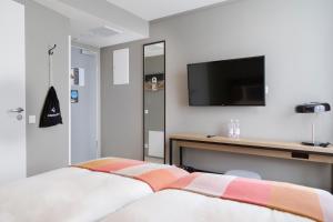 Llit o llits en una habitació de Generator Hamburg