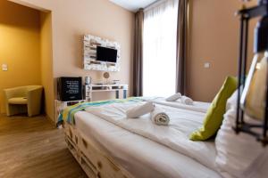 TV a/nebo společenská místnost v ubytování Hotel Carpe Diem
