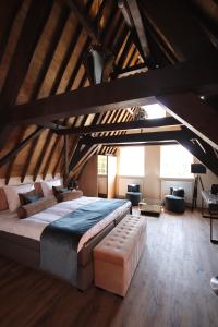 Katil atau katil-katil dalam bilik di Boutique Hotel Steenhof Suites - Adults Only