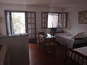 Postel nebo postele na pokoji v ubytování Motel Logis d'Abartello