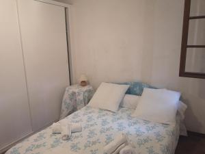 Postel nebo postele na pokoji v ubytování Motel Logis d'Abartello