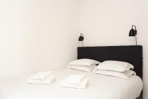 En eller flere senge i et værelse på Beaumarchais