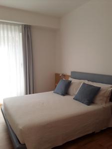 Postel nebo postele na pokoji v ubytování h-sa GUEST HOUSE