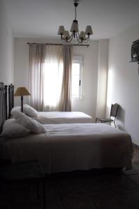 Cama o camas de una habitación en Casa Rural La Jara