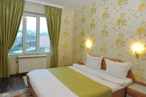 Postel nebo postele na pokoji v ubytování Eros Motel