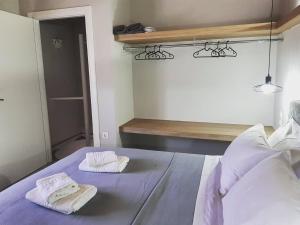 Posteľ alebo postele v izbe v ubytovaní Avres Apartments