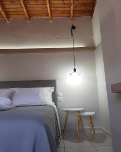 Posteľ alebo postele v izbe v ubytovaní Avres Apartments