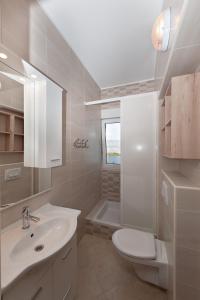 Koupelna v ubytování Apartements Magdalena + 37 fotografií