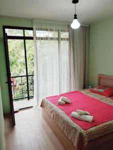 Postel nebo postele na pokoji v ubytování Guesthouse Maria + 37 fotografií