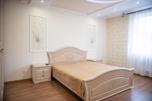 Ein Bett oder Betten in einem Zimmer der Unterkunft Затишна оселя