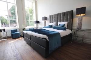 Katil atau katil-katil dalam bilik di Boutique Hotel Steenhof Suites - Adults Only