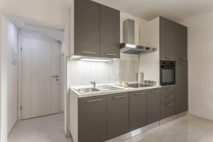 Kuchyňa alebo kuchynka v ubytovaní Royal Silver Apartment