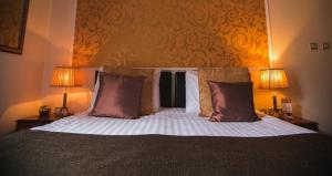 Ліжко або ліжка в номері Dublin Citi Hotel of Temple Bar