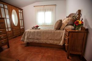 Voodi või voodid majutusasutuse Casa Rural El Retiro de los Casasola toas