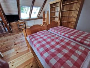 Postel nebo postele na pokoji v ubytování Penzion Okamžik Stanovice