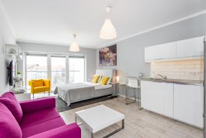Posteľ alebo postele v izbe v ubytovaní Super-Apartamenty Old Market