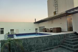 Πισίνα στο ή κοντά στο Asuncion Gracia Suites