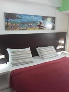 Giường trong phòng chung tại Sonia Flats Pipa's Bay - Flat 211