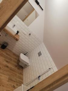 Koupelna v ubytování Apartamenty Łebska Ostoja