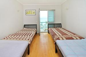 Postel nebo postele na pokoji v ubytování Tara lake apartments