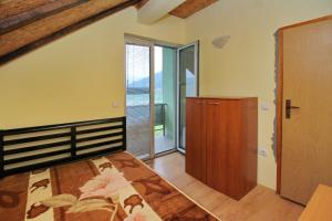 Postel nebo postele na pokoji v ubytování Tara lake apartments