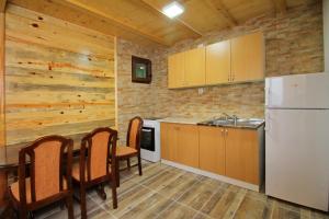 Kuchyň nebo kuchyňský kout v ubytování Tara lake apartments