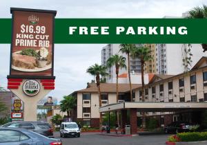 a sign that says free parking in front of a hotel at Ellis Island Hotel Casino & Brewery in Las Vegas