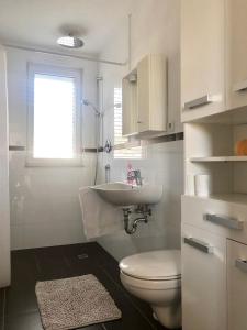 Kúpeľňa v ubytovaní Apartmani Dujmovic