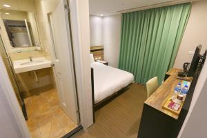 Phòng tắm tại 鼎立安商務旅館 Dinglian Hotel