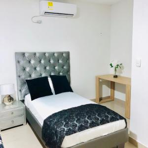 Ein Bett oder Betten in einem Zimmer der Unterkunft Hotel Platinum Barranquilla