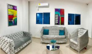 Ein Sitzbereich in der Unterkunft Hotel Platinum Barranquilla
