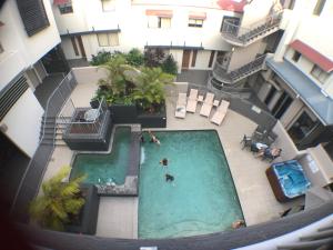 A view of the pool at Penthouse Apartment, 7 Beach Road, Coolum Beach or nearby