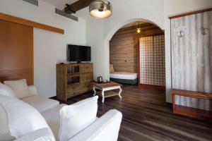 TV a/nebo společenská místnost v ubytování Best Western Maison B Hotel