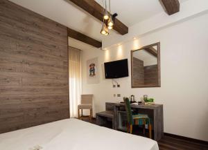 TV a/nebo společenská místnost v ubytování Best Western Maison B Hotel