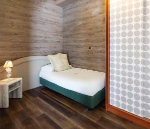 Postel nebo postele na pokoji v ubytování Best Western Maison B Hotel