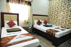 Postel nebo postele na pokoji v ubytování Rightchoicehotels