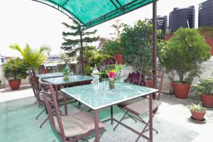 Giardino di Hotel Mums Home